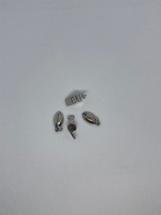 silver football/whistle